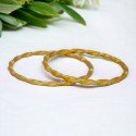 Trendsetting Gold Plated Twisted Bangles For Girls