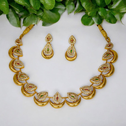 Alluring Gold Plated American Diamond Chand Gopi Necklace Set